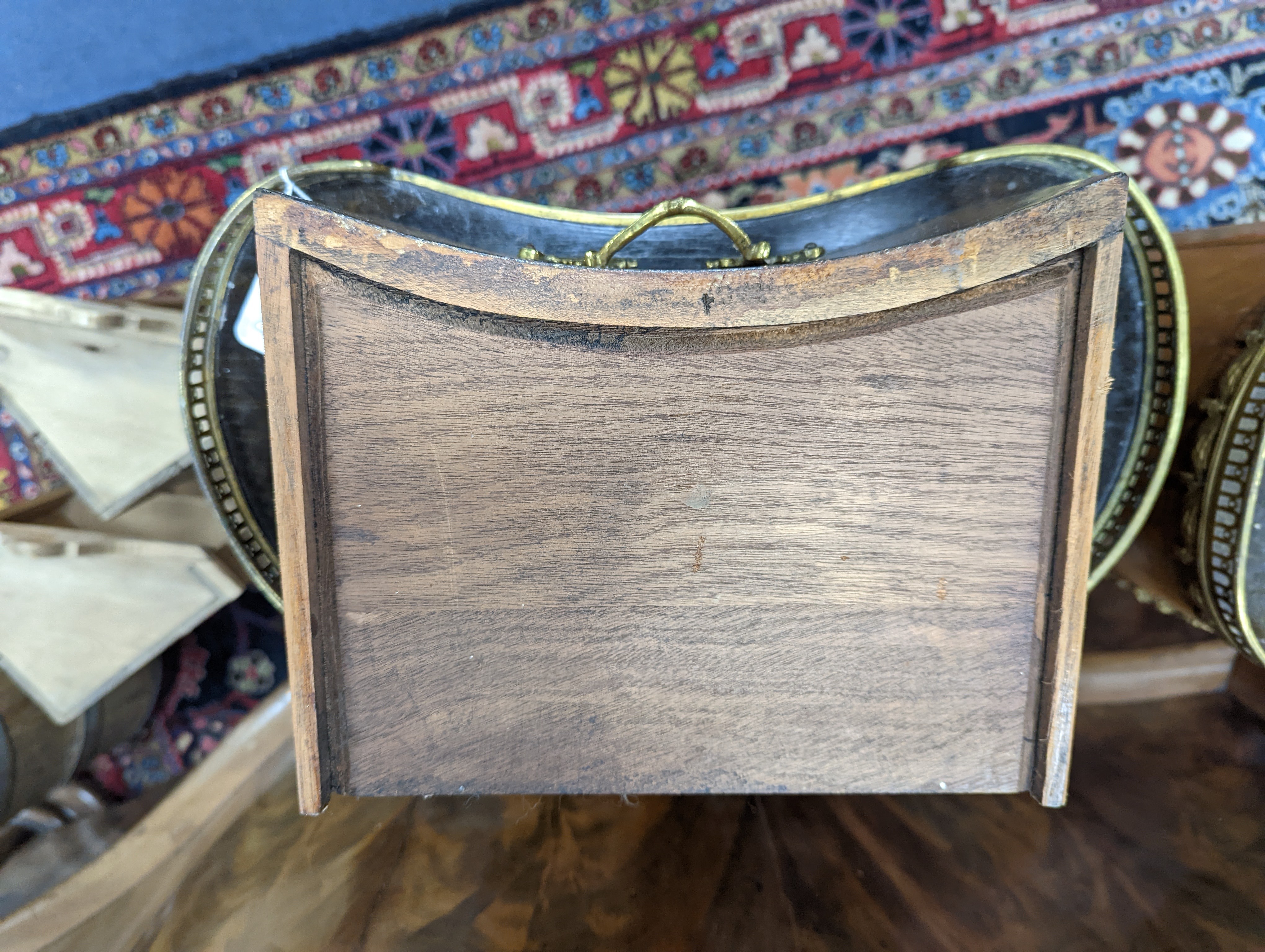 A pair of French marquetry inlaid gilt metal mounted kidney shaped two drawer bedside cabinets, width 42cm, depth 24cm, height 77cm